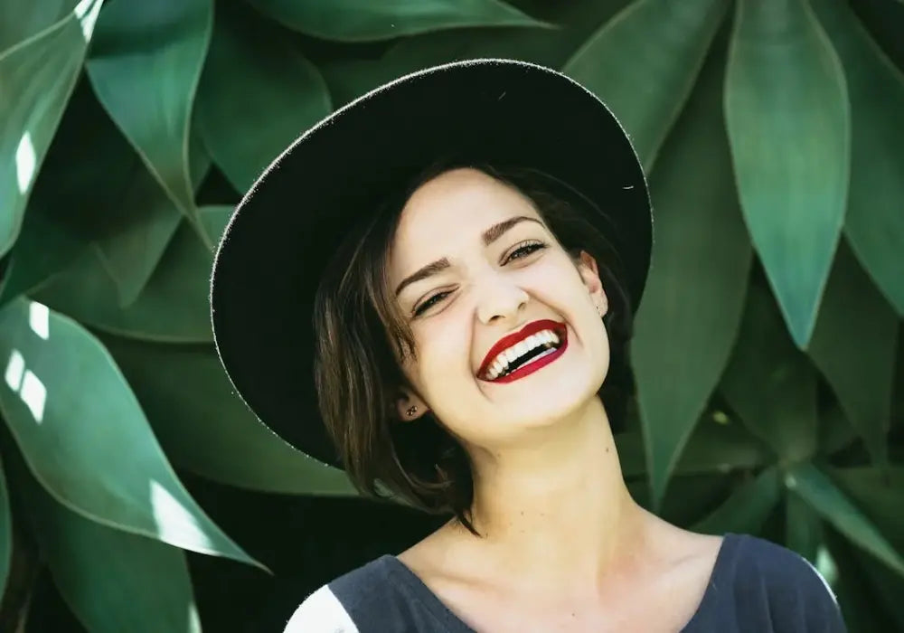 Advantages of mouth-shaped toothbrushes shown through a smart toothbrush paired with a mobile app for real-time dental analysis.