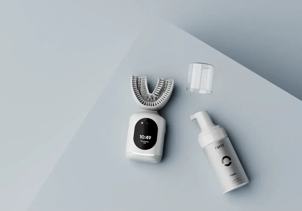 Modern sonic toothbrush with a U-shaped design, digital display, and foam toothpaste for an advanced and efficient oral care routine.