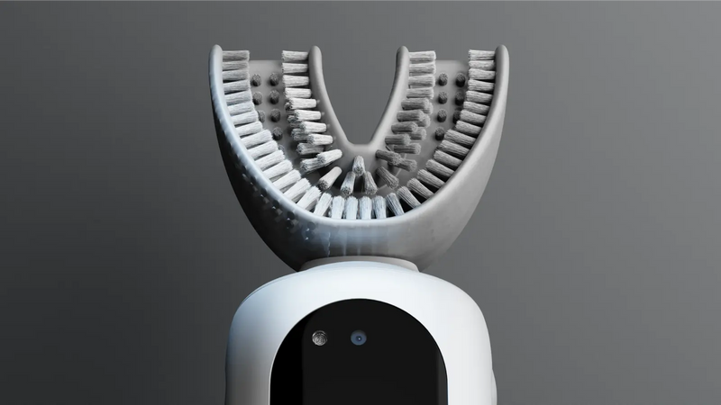 Mouth-shaped toothbrush with dense bristles & a modern digital design for efficient full-mouth cleaning