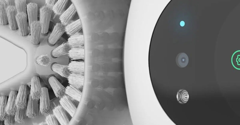 Close-up of the Feno automatic toothbrush bristles and digital display, highlighting precision design and advanced technology