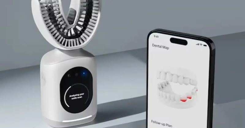 Smart electric toothbrush paired with a dental map on a smartphone, demonstrating advanced oral health tracking
