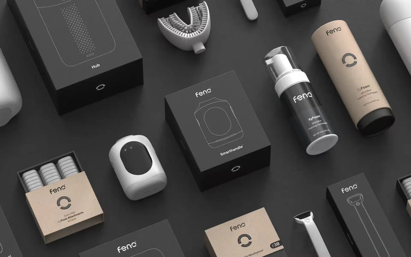 Dental hygiene tools including smart toothbrush, foaming toothpaste, mouthpiece, and accessories in premium modern packaging