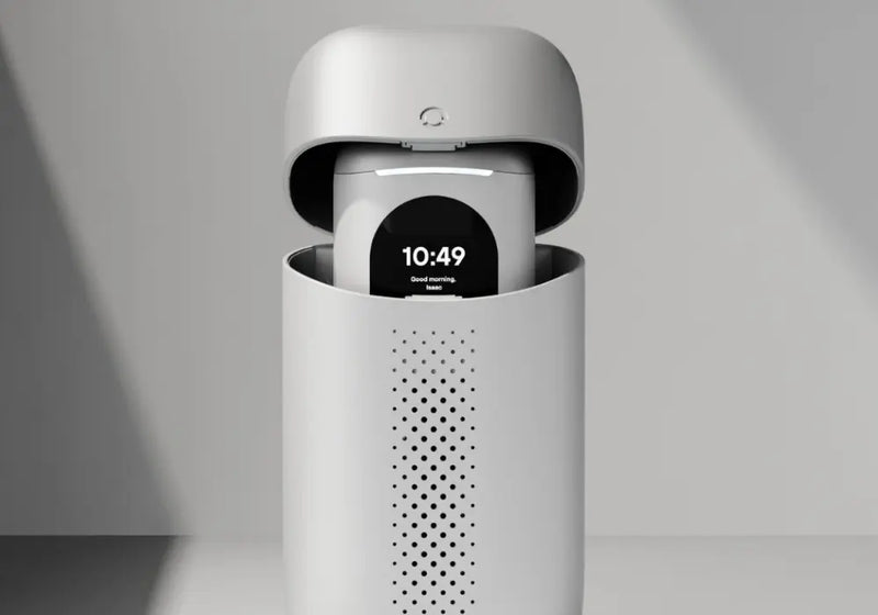 App-connected toothbrush docked inside a sleek charging and storage case with digital display visible