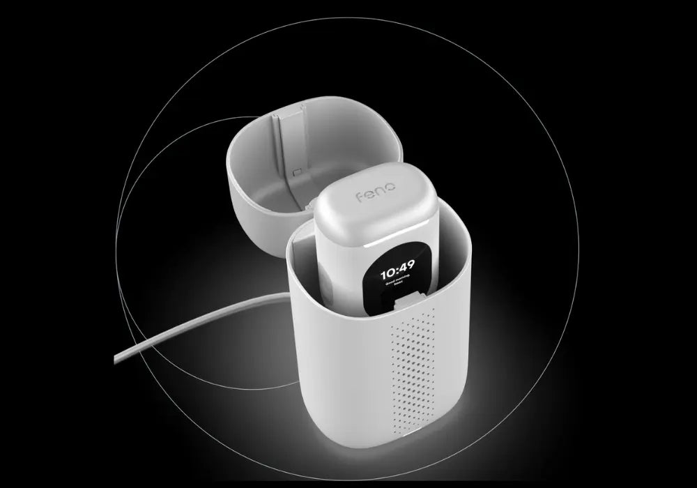 Connected toothbrush stored inside sleek charging case with digital screen and circular lighting indicator