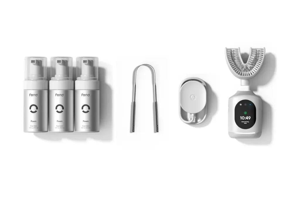 Dentist-recommended toothbrush kit featuring Feno smartbrush, foams, tongue scraper, and wireless charger.