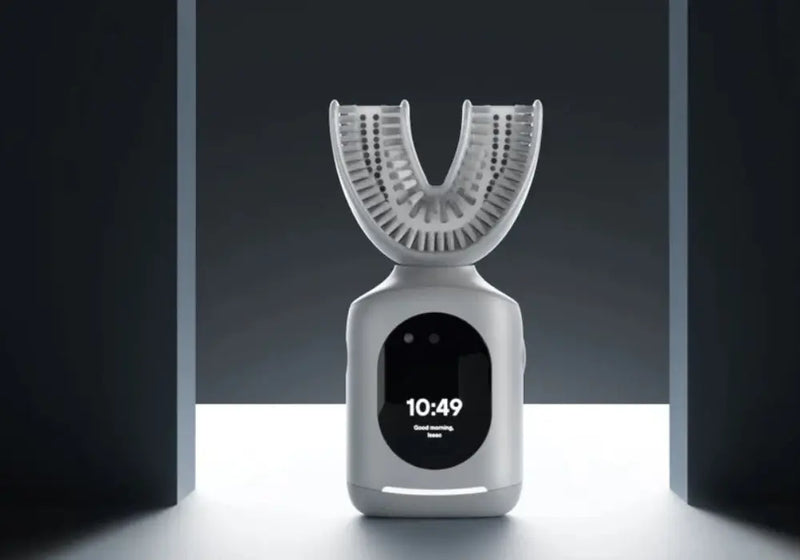 Hands-free U brush shown in sleek, modern lighting with time display and smart functionality.