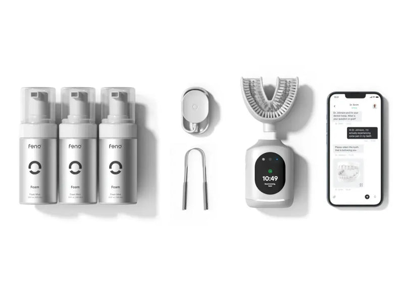 Smart oral hygiene tools including Feno brush, foaming cleansers, scraper, charger, and connected app.