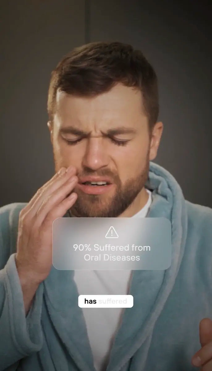 Person in a robe wincing with jaw pain beside text: 90% suffered from oral diseases.