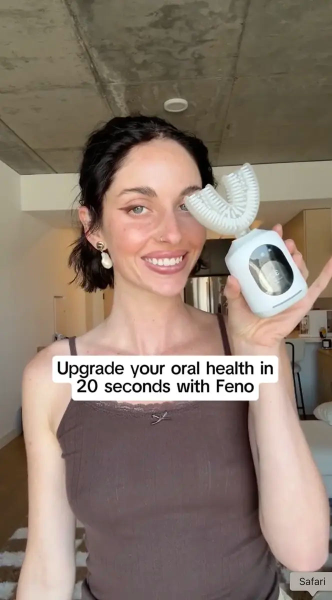 Person holding up Feno U-shaped smart toothbrush with caption about upgrading oral health in 20 seconds.